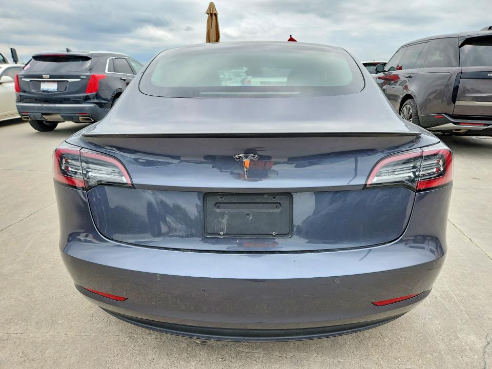 2021 Tesla Model 3 VIN 5YJ3E1EA7MF093886 COPART salvage auction — NORMAL WEAR, Tx - Cert Of Title-Rebuilt Salvage (P), sold $12,600 on 2026-07-30 (photo 6)