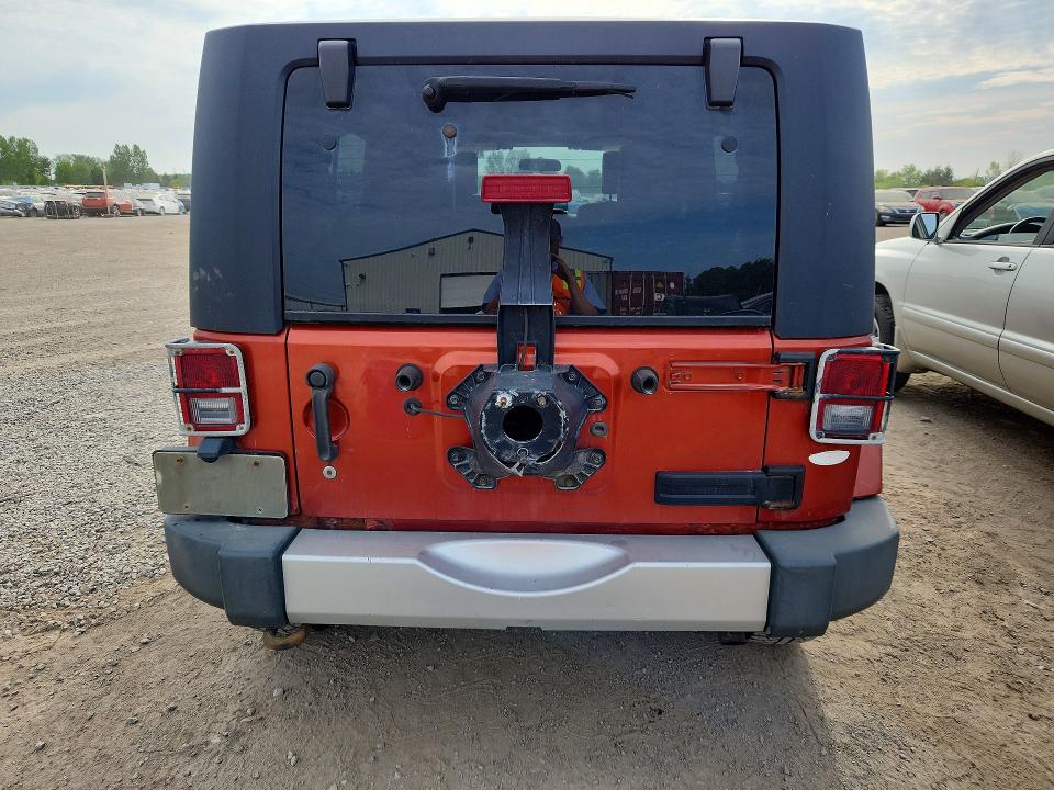 2009 Jeep Wrangler unlimited VIN 1J4GA59149L731962 COPART salvage auction — FRONT END, ON - PERMIT SALVAGE, sold $1,800 on 2026-07-28 (photo 6)