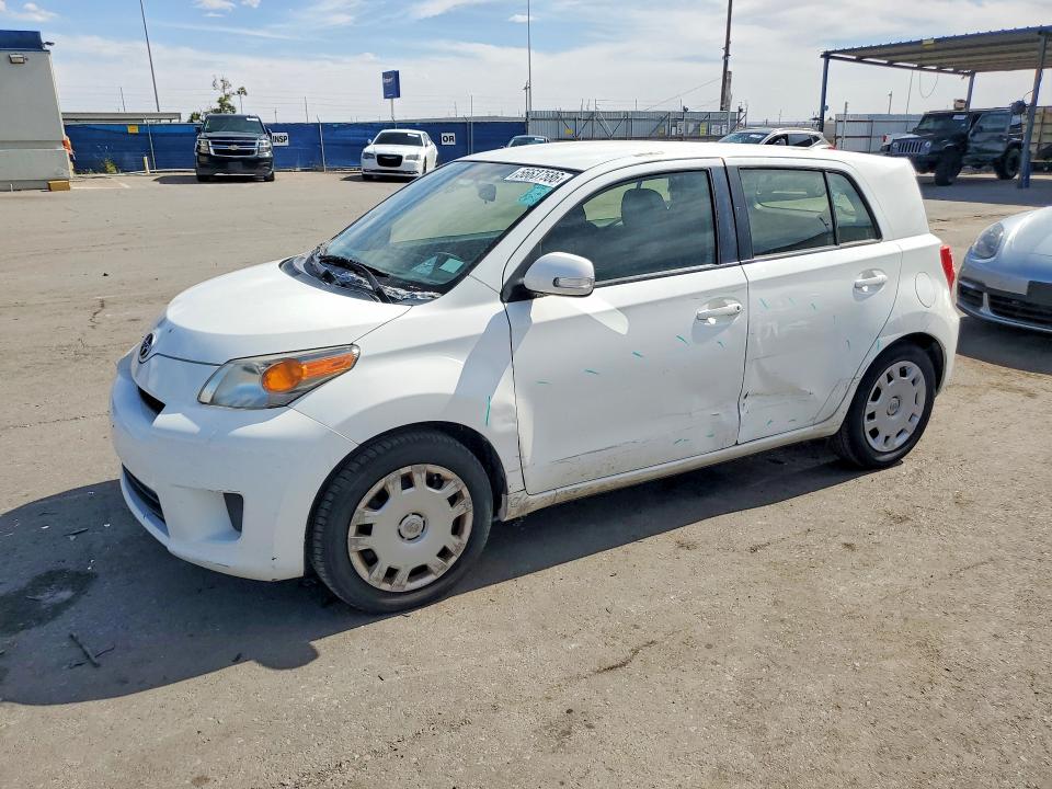 2014 Scion VIN JTKKUPB40E1040840 COPART salvage auction — SIDE, Nm - Cert Of Title-Salvage, sold $1,350 on 2026-07-10 (photo 1)
