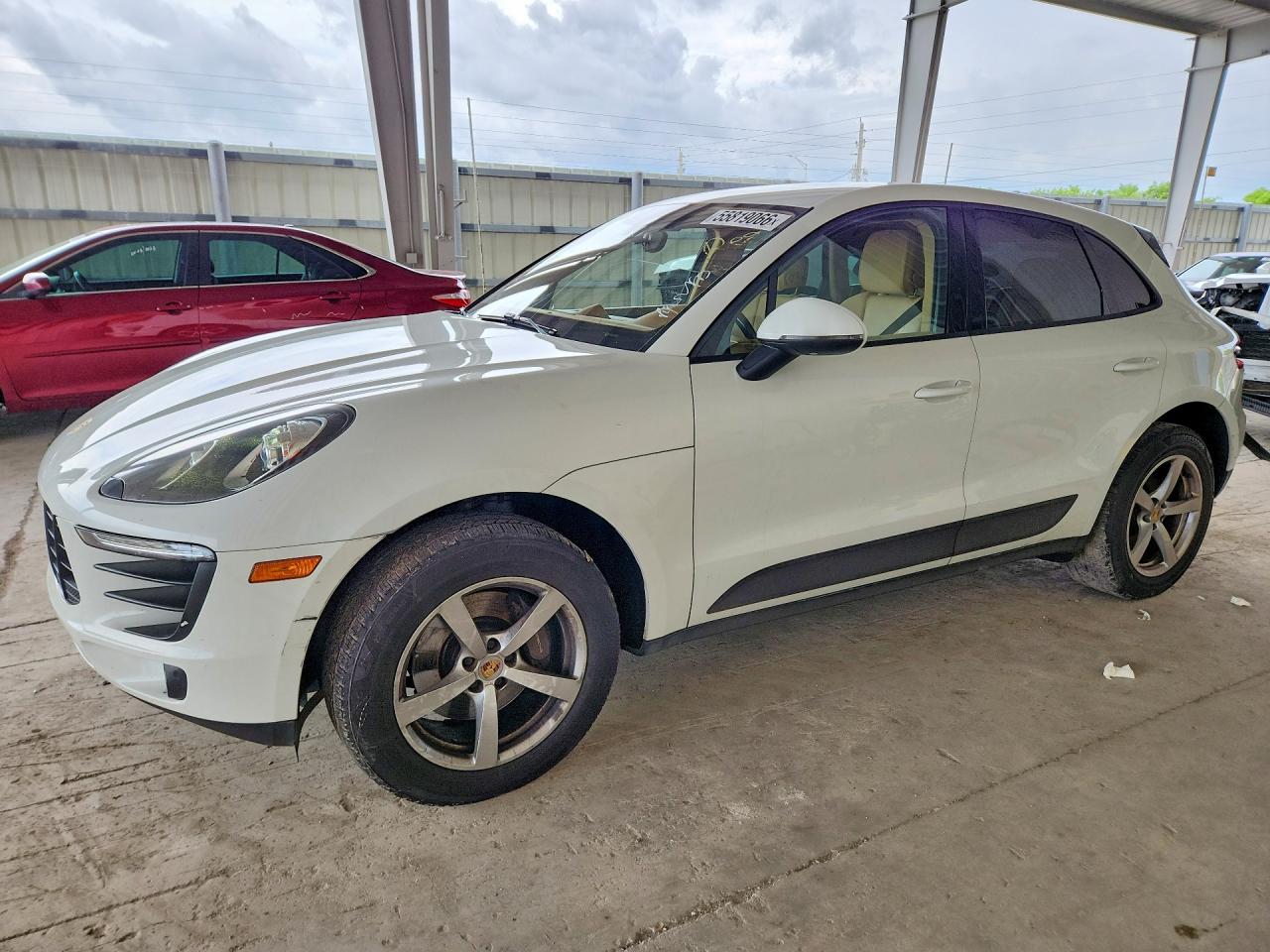 2017 Porsche Macan VIN WP1AA2A50HLB07467 COPART salvage auction — Side, FL - CERTIFICATE OF TITLE, sold $4,200 on 2026-07-01 (photo 1)