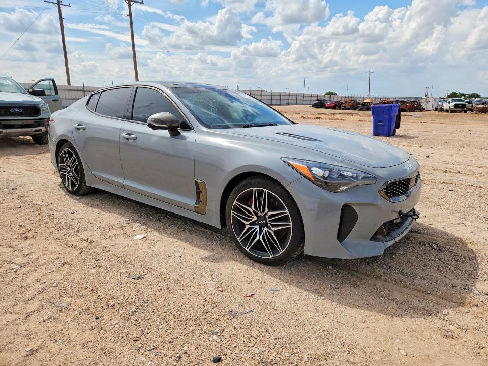 2022 Kia Stinger VIN KNAE55LCXN6099857 COPART salvage auction — WATER/FLOOD, TX - SALVAGE VEHICLE TITLE, sold $2,100 on 2026-07-29 (photo 4)