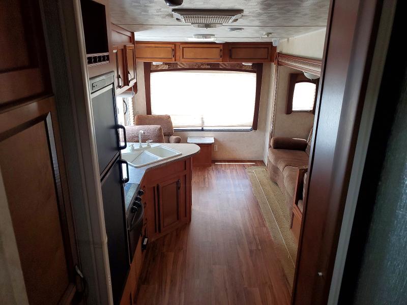 2013 Gulf stream Conquest VIN 1NL1GFL29D1109566 COPART salvage auction — HAIL, MO - SALVAGE CERTIFICATE OF TITLE, sold $2,750 on 2026-07-09 (photo 6)