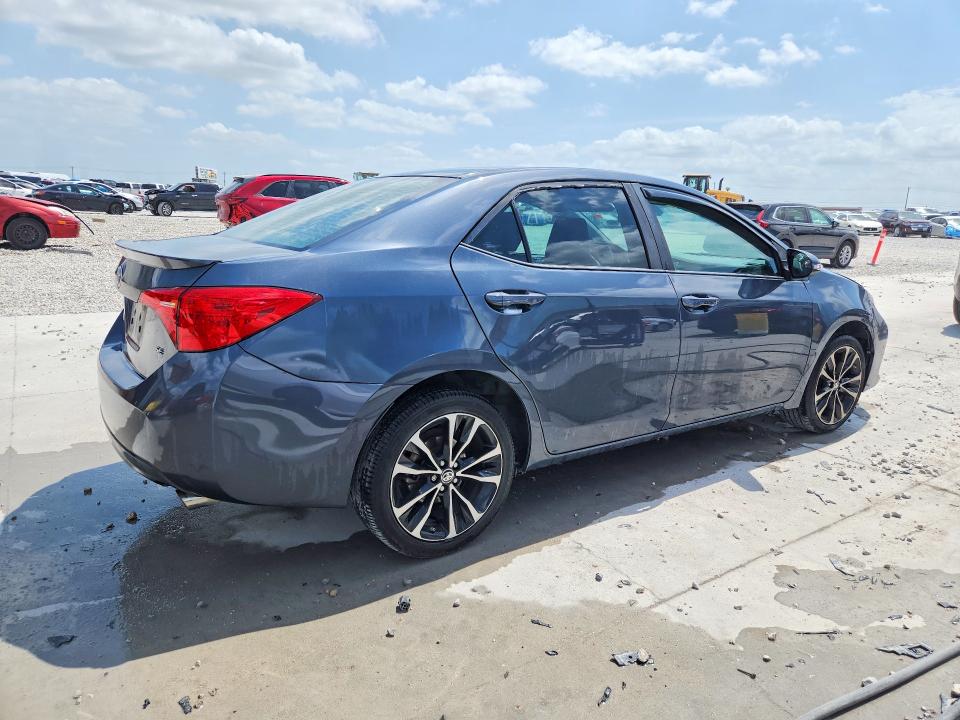 2018 Toyota Corolla VIN 5YFBURHE5JP816565 COPART salvage auction — WATER/FLOOD, TX - SALVAGE TITLE-FLOOD DAMAGE, sold $1,800 on 2026-07-24 (photo 3)