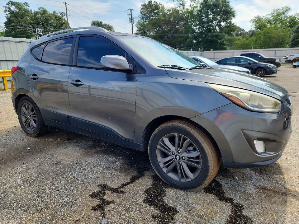 2015 Hyundai Tucson VIN KM8JU3AG4FU054923 COPART salvage auction — SIDE, Fl - Cert Of Title Slvg Rebuildable, sold $650 on 2026-07-13 (photo 4)