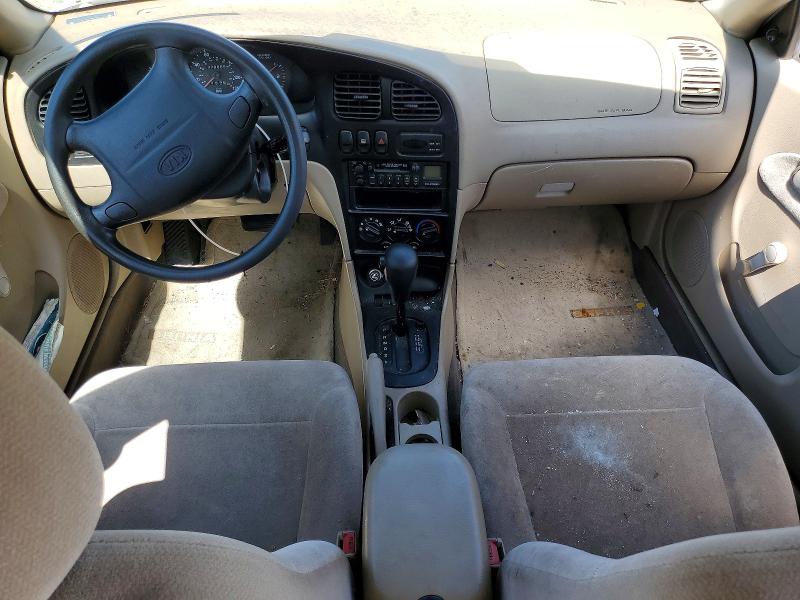 2001 Kia Sephia VIN KNAFB121615011750 COPART salvage auction — MECHANICAL, In - Certificate Of Title, sold $325 on 2026-07-13 (photo 8)