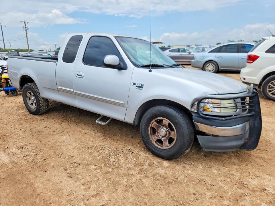 2001 Ford F-150 lightning VIN 1FTRX17W61KC65708 COPART salvage auction — UNDERCARRIAGE, Tx - Salvage Vehicle Title, sold $975 on 2026-07-02 (photo 4)