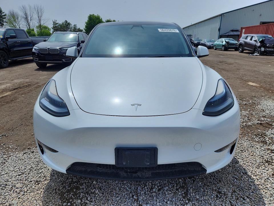 2023 Tesla Model y VIN LRWYGDFDXPC901706 COPART salvage auction — REAR END, On - Permit Salvage, sold $6,600 on 2026-07-28 (photo 5)