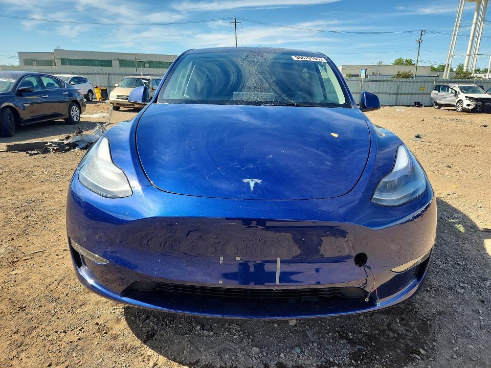 2023 Tesla Model y VIN 7SAYGDEE0PA205372 COPART salvage auction — REAR END, Il - Salvage Certificate, sold $9,900 on 2026-07-29 (photo 5)