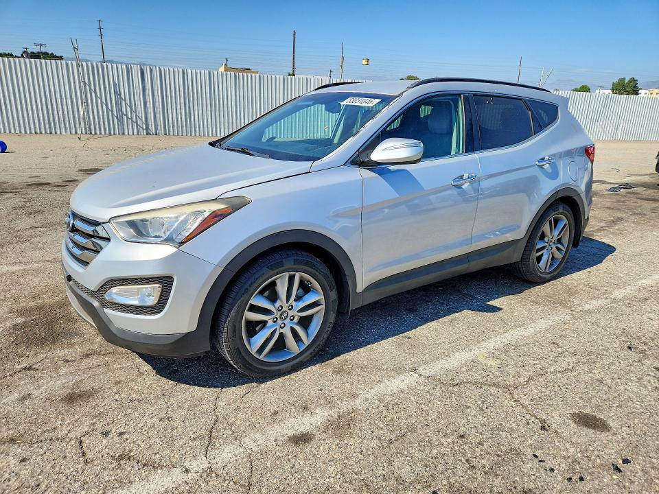 2014 Hyundai Santa fe VIN 5XYZU3LA8EG191542 COPART salvage auction — VANDALISM, Ca - Salvage Certificate, sold $1,750 on 2026-07-31 (photo 1)