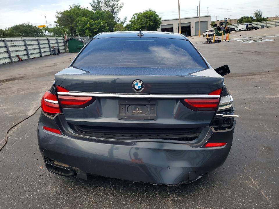 2016 BMW 7er VIN WBA7F2C52GG418655 COPART salvage auction — SIDE, Fl - Cert Of Title Slvg Rebuildable, sold $5,000 on 2026-07-08 (photo 6)