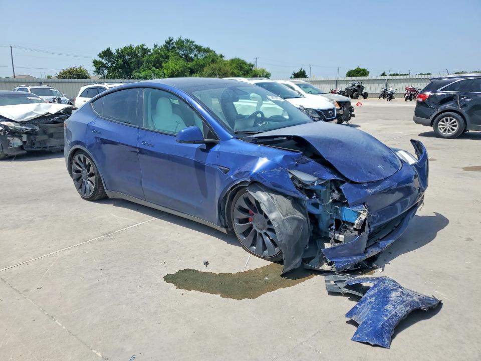 2023 Tesla Model y VIN 7SAYGDEF2PF749870 COPART salvage auction — FRONT END, TX - SALVAGE VEHICLE TITLE, sold $9,500 on 2026-07-20 (photo 4)