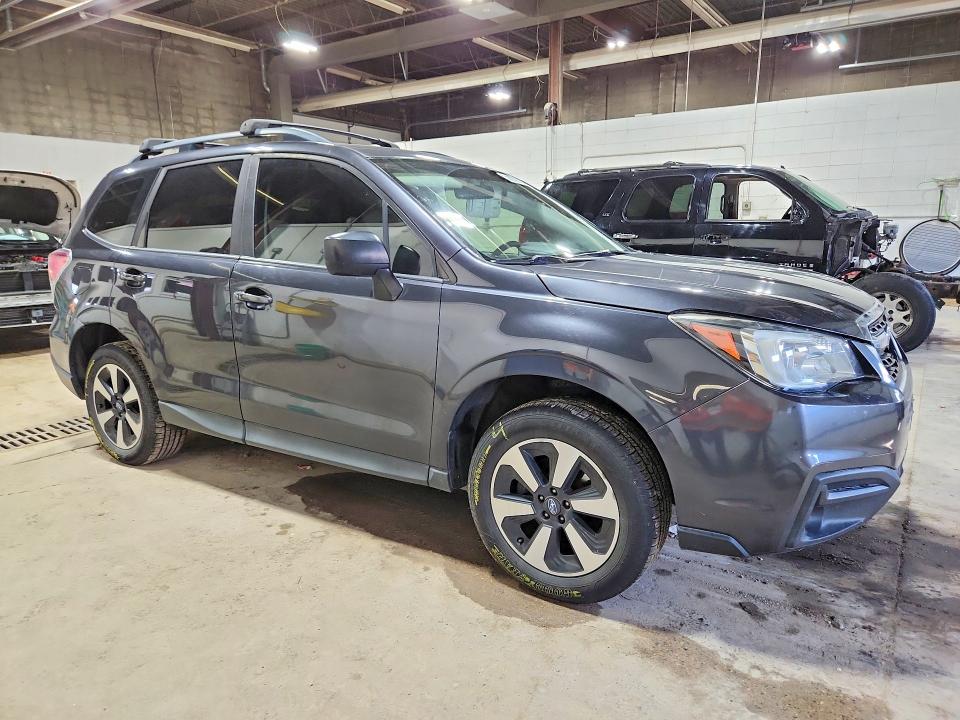 2017 Subaru Forester VIN JF2SJABC5HH594571 COPART salvage auction — REAR END, Mn - Cert Of Title-Prior Salvage, sold $1,900 on 2026-07-23 (photo 4)