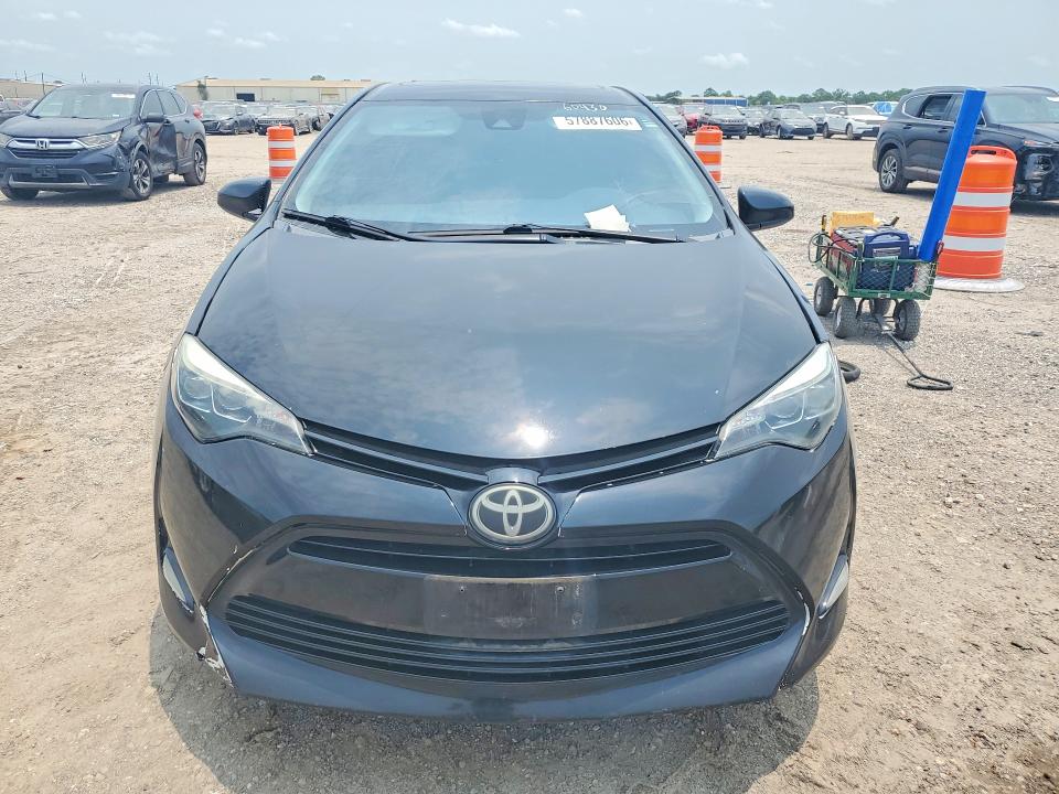 2018 Toyota Corolla VIN 5YFBURHE3JP840962 COPART salvage auction — SIDE, Tx - Salvage Vehicle Title, sold $2,450 on 2026-07-27 (photo 5)