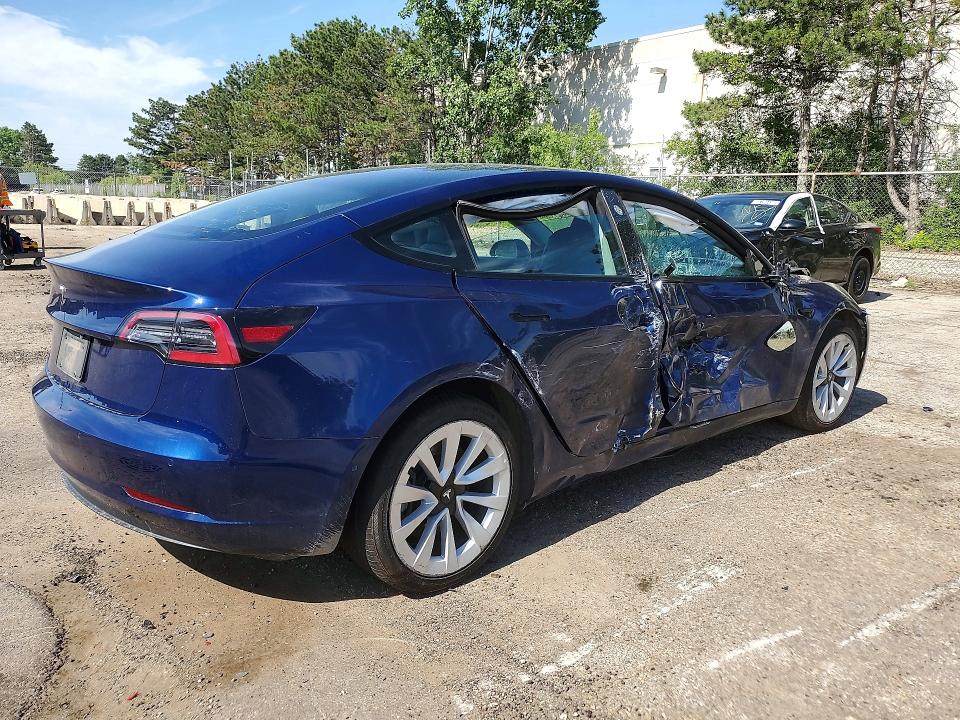 2022 Tesla Model 3 VIN 5YJ3E1EA1NF189028 COPART salvage auction — SIDE, Il - Salvage Certificate, sold $3,300 on 2026-07-20 (photo 3)