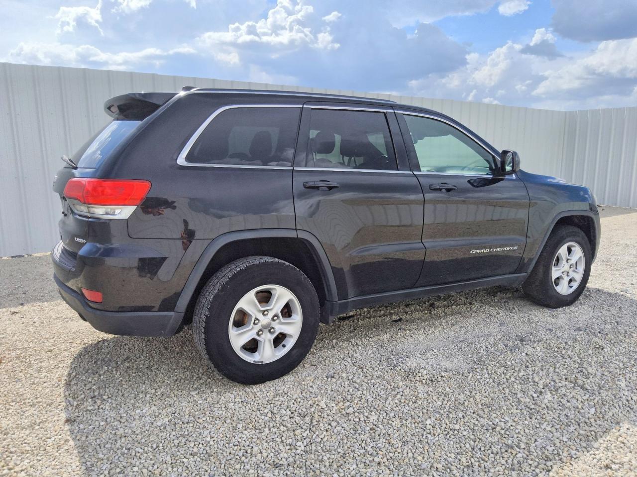 2015 Jeep Grand Cherokee VIN 1C4RJFAG4FC833391 COPART salvage auction — Normal Wear, FL - CERTIFICATE OF TITLE, sold $400 on 2026-07-09 (photo 3)
