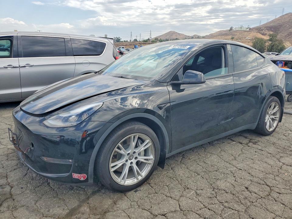 2023 Tesla Model y VIN 7SAYGDEE3PF884606 — COPART salvage auction photo