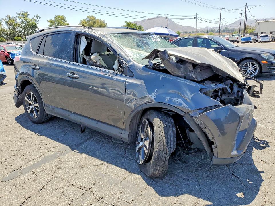 2017 Toyota Rav 4 VIN JTMWFREV5HD096522 COPART salvage auction — ROLLOVER, Ca - Salvage Certificate, sold $1,100 on 2026-07-16 (photo 4)