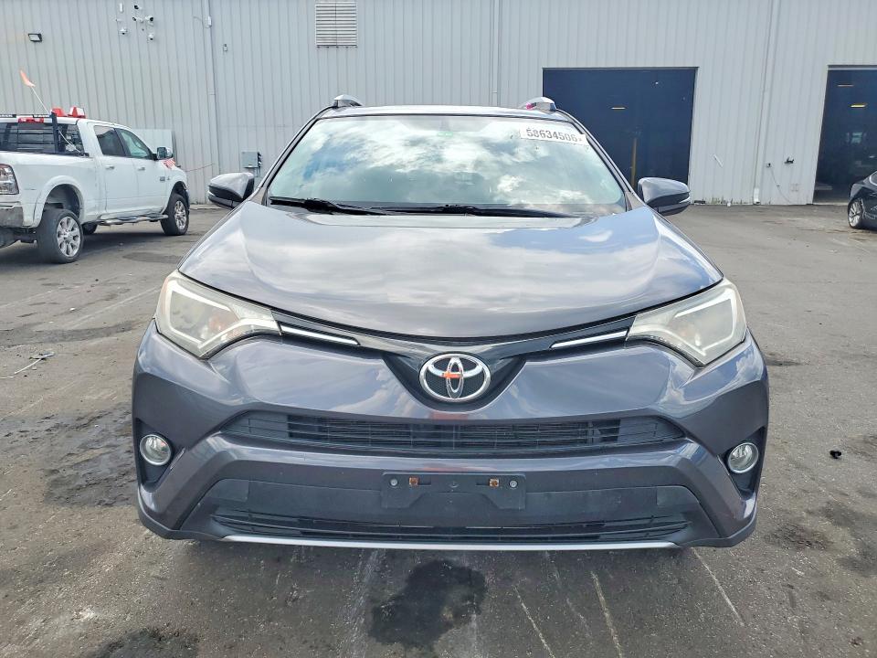 2016 Toyota Rav 4 VIN JTMWFREV9GJ091405 COPART salvage auction — REAR END, Fl - Cert Of Title Slvg Rebuildable, sold $1,950 on 2026-07-13 (photo 5)