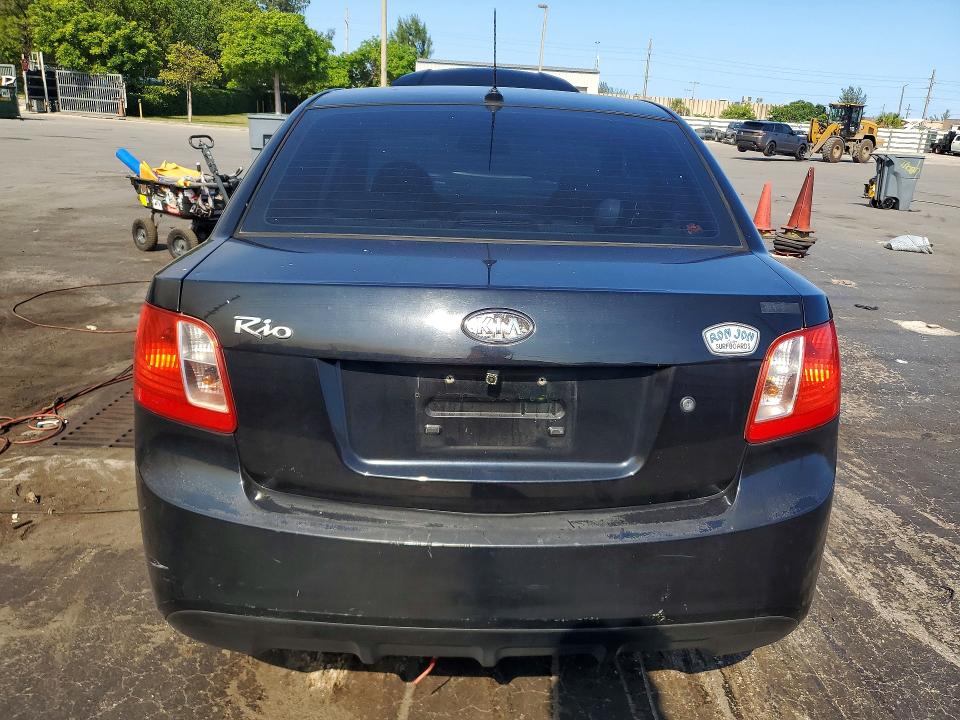 2010 Kia Rio VIN KNADH4A38A6635781 COPART salvage auction — SIDE, Fl - Cert Of Title Slvg Rebuildable, sold $425 on 2026-07-11 (photo 6)
