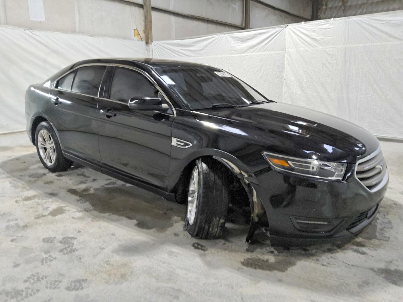 2018 Ford Taurus VIN 1FAHP2E80JG120162 COPART salvage auction — Undercarriage, MS - CERTIFICATE OF TITLE, sold $850 on 2026-07-09 (photo 4)
