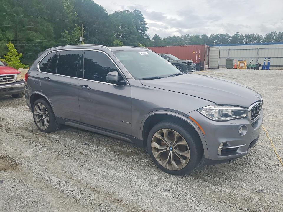 2015 BMW VIN 5UXKR0C58F0K62569 COPART salvage auction — MINOR DENT/SCRATCHES, Ms - Certificate Of Title, sold $4,850 on 2026-07-29 (photo 4)