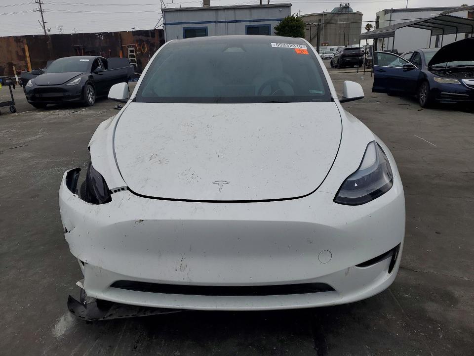 2023 Tesla Model y VIN 7SAYGDEFXPF917545 COPART salvage auction — FRONT END, Ca - Salvage Certificate, sold $10,500 on 2026-07-02 (photo 5)