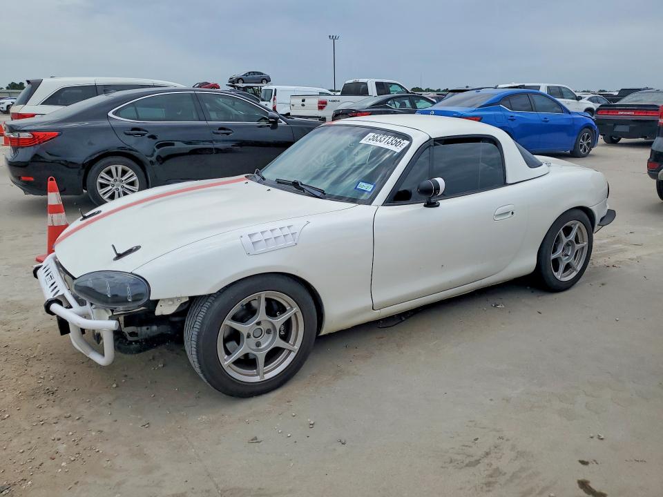 1999 Mazda Mx-5 VIN JM1NB3538X0100989 COPART salvage auction — WATER/FLOOD, Tx - Salvage Title-Flood Damage, sold $5,300 on 2026-07-23 (photo 1)