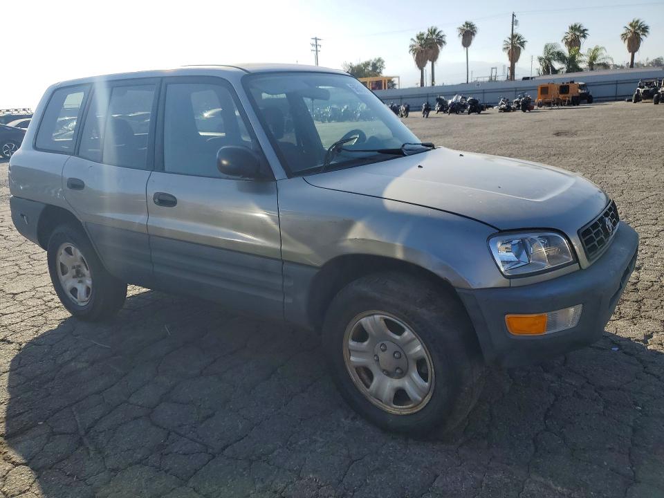 1999 Toyota Rav4 VIN JT3GP10V9X7057105 COPART salvage auction — REAR END, CA - DIS/DLR/EXP ONLY CLEAN TITLE, sold $200 on 2026-07-09 (photo 4)