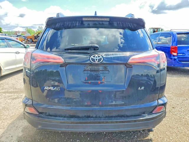 2018 Toyota Rav4 VIN 2T3ZFREV4JW476554 COPART salvage auction — WATER/FLOOD, ON - PERMIT NO BRAND - UNFIT, sold $8,400 on 2026-07-02 (photo 6)