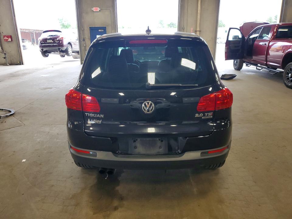 2014 Volkswagen Tiguan VIN WVGBV3AX3EW618744 COPART salvage auction — MINOR DENT/SCRATCHES, Mn - Certificate Of Title, sold $1,050 on 2026-07-16 (photo 6)