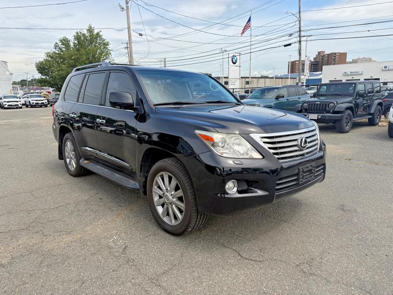 2011 Lexus Lx 570 VIN JTJHY7AX5B4082039 COPART salvage auction — MINOR DENT/SCRATCHES, MA - CERTIFICATE OF TITLE (P), sold $20,800 on 2026-07-14 (photo 1)