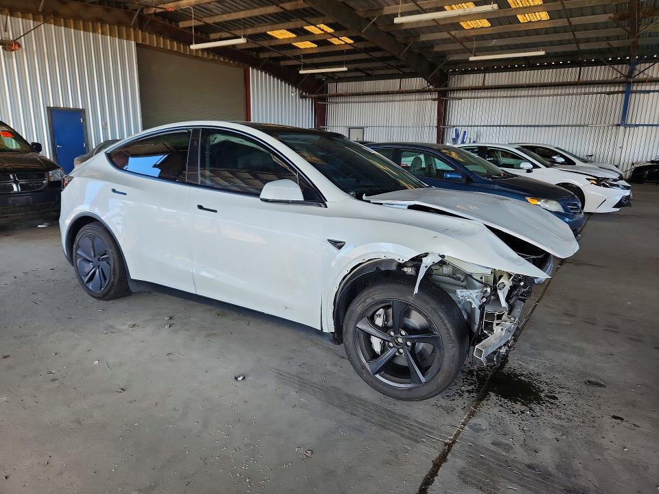 2026 Tesla Model y VIN 7SAYGDEE8TF438574 COPART salvage auction — FRONT END, CA - SALVAGE CERTIFICATE, sold $10,200 on 2026-07-27 (photo 4)