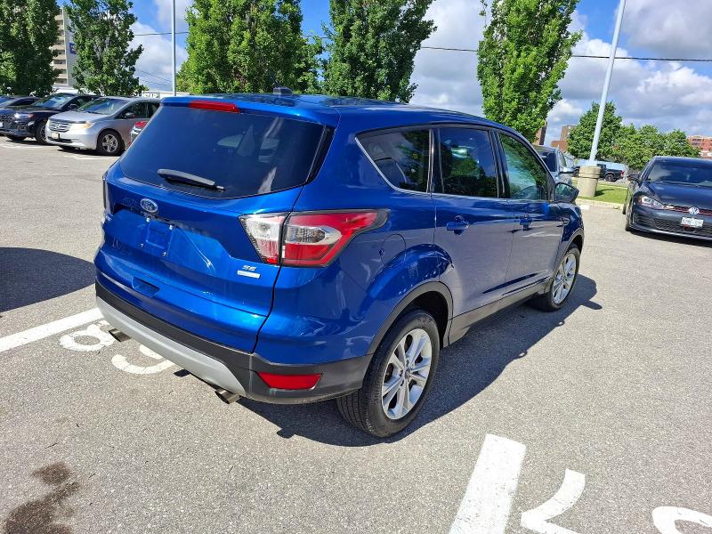2017 Ford Escape VIN 1FMCU0GDXHUB17014 COPART salvage auction — MINOR DENT/SCRATCHES, On - Permit No Brand - Unfit (P), sold $1,500 on 2026-07-03 (photo 4)