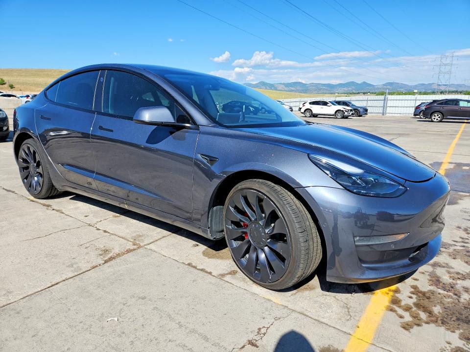 2022 Tesla VIN 5YJ3E1EC6NF277798 COPART salvage auction — FRONT END, CO - PUBLIC - SALVAGE TITLE, sold $10,100 on 2026-07-20 (photo 4)