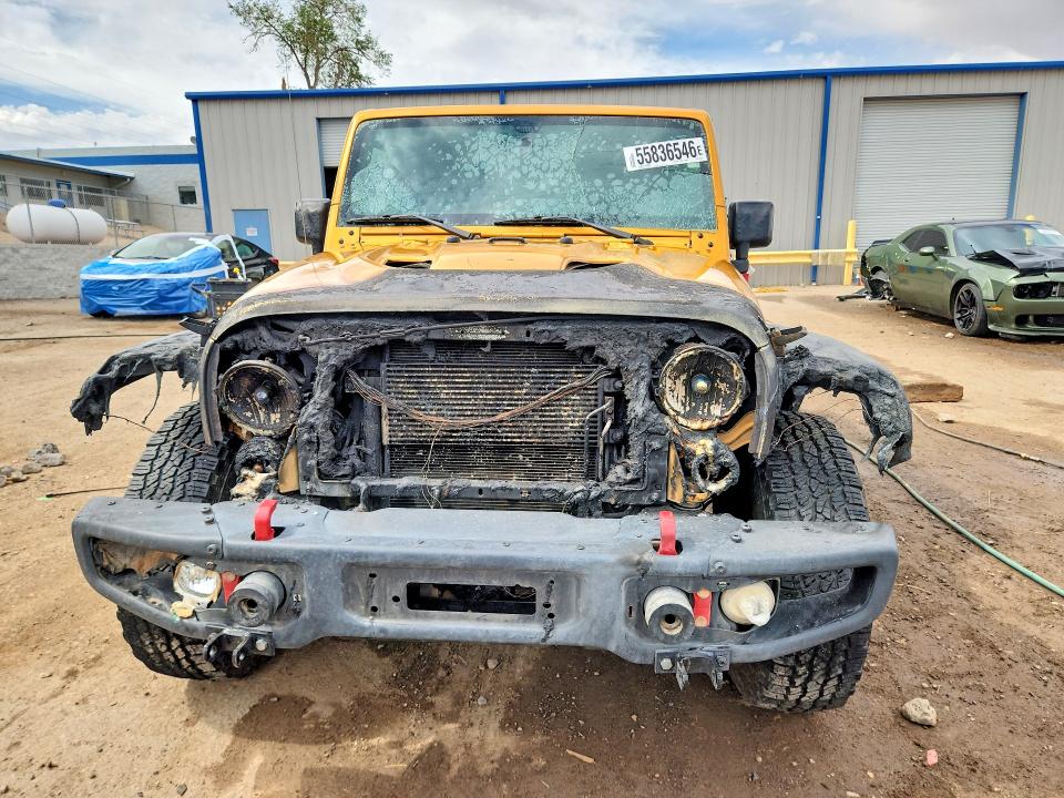 2014 Jeep Wrangler / VIN 1C4HJWFG0EL302028 COPART salvage auction — ENGINE BURN, Nm - Non-Repairable Vehicle Cert, sold $200 on 2026-07-23 (photo 5)