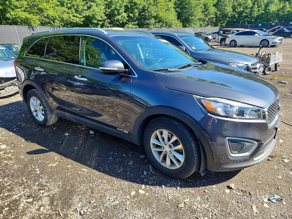 2016 Kia Sorento VIN 5XYPGDA56GG174767 COPART salvage auction — VANDALISM, MD - CERT OF SALVAGE > 75% DAMAGE, sold $1,800 on 2026-07-28 (photo 4)