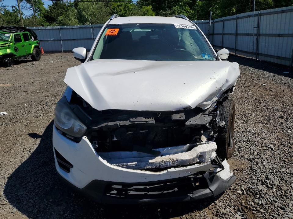 2016 Mazda Cx-5 VIN JM3KE4BY9G0751281 COPART salvage auction — SIDE, Nj - Cert Of Title-Salvage, sold $1,550 on 2026-07-14 (photo 5)