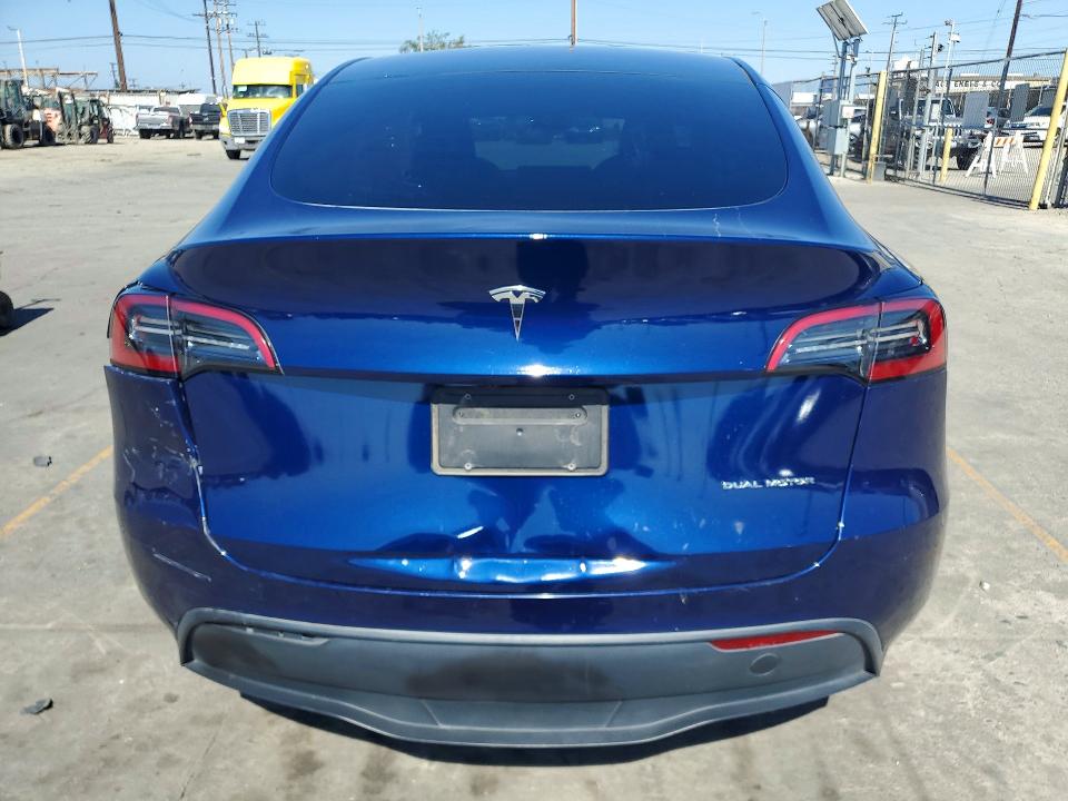 2023 Tesla Model y VIN 7SAYGDEE6PA041108 COPART salvage auction — REAR END, Ca - Salvage Certificate, sold $15,100 on 2026-07-29 (photo 6)
