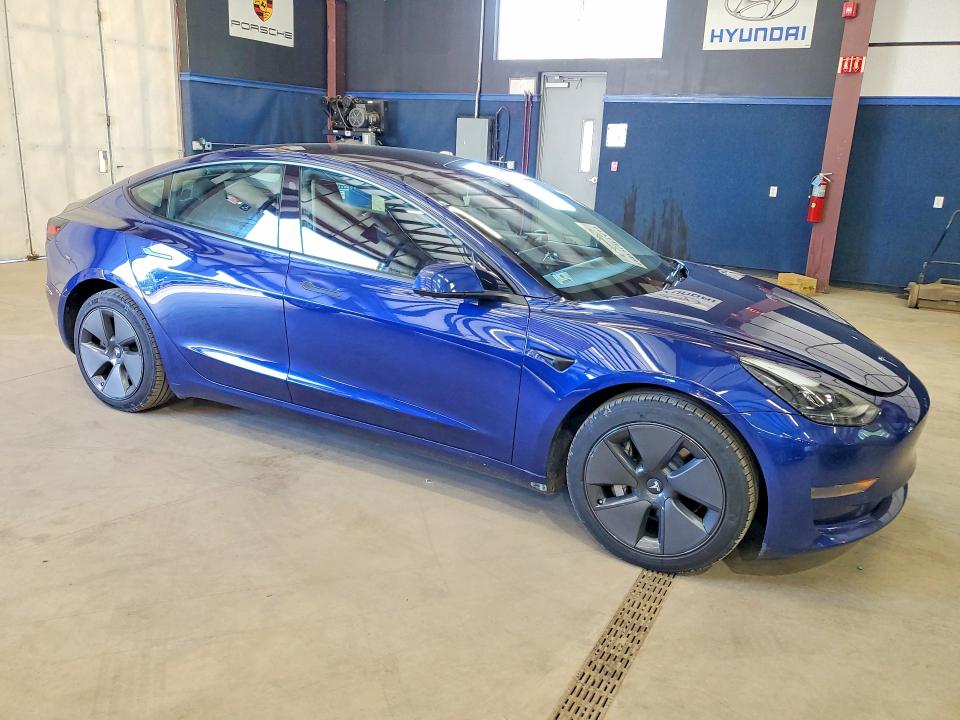 2023 Tesla Model 3 VIN 5YJ3E1EA0PF550980 COPART salvage auction — MINOR DENT/SCRATCHES, Ma - Cert Of Title-Reconstrctd Coll (P), sold $13,600 on 2026-07-02 (photo 4)
