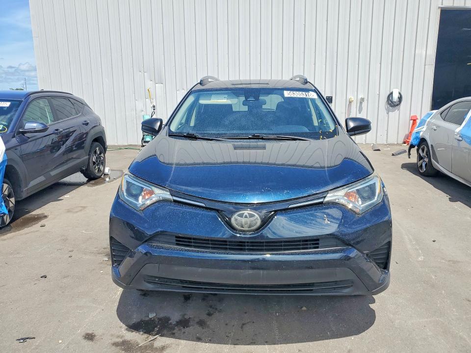 2018 Toyota Rav 4 VIN JTMZFREV9JJ174014 COPART salvage auction — MINOR DENT/SCRATCHES, Fl - Certificate Of Title, sold $6,300 on 2026-07-07 (photo 5)