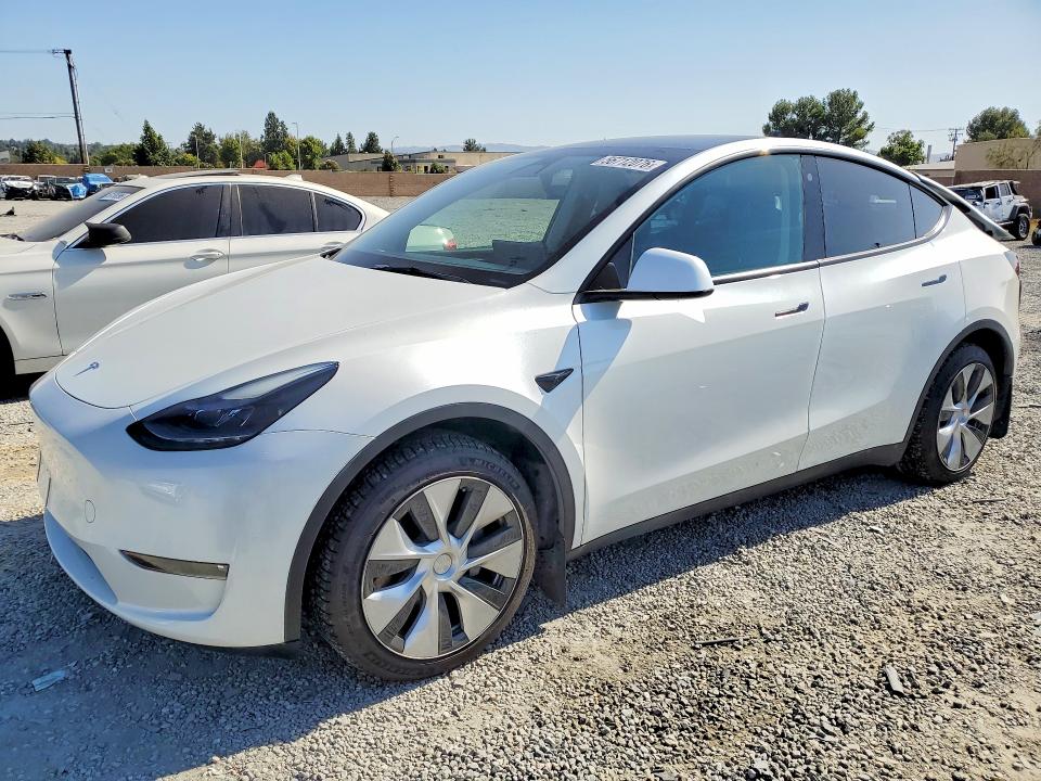 2023 Tesla Model y VIN 7SAYGAEE0PF686273 — COPART salvage auction photo