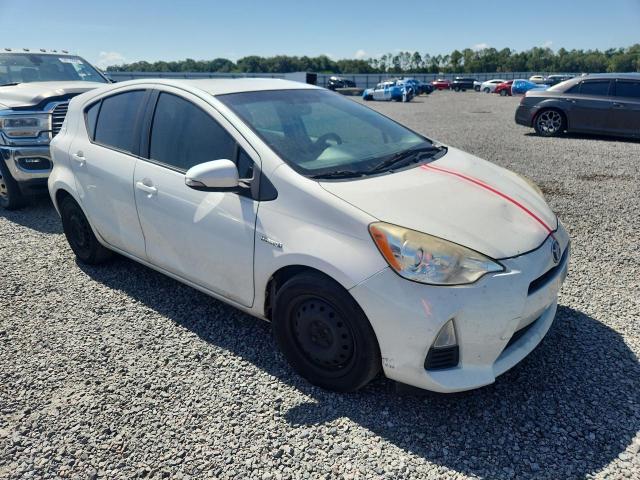 2014 Toyota Prius c VIN JTDKDTB3XE1572717 COPART salvage auction — MINOR DENT/SCRATCHES, Fl - Certificate Of Title, sold $1,050 on 2026-07-07 (photo 4)