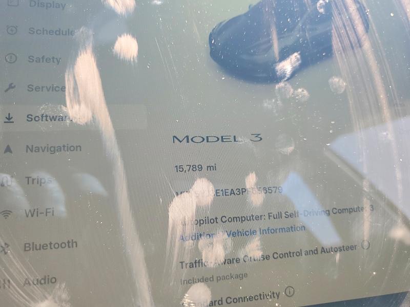 2023 Tesla Model 3 VIN 5YJ3E1EA3PF656579 COPART salvage auction — SIDE, Salvage Title, sold $8,300 on 2026-07-13 (photo 9)
