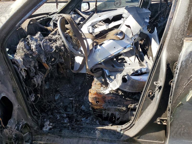 2005 Toyota VIN 2T1LR32E35C458187 COPART salvage auction — ENGINE BURN, Az - Certificate Of Title, sold $475 on 2026-08-03 (photo 7)