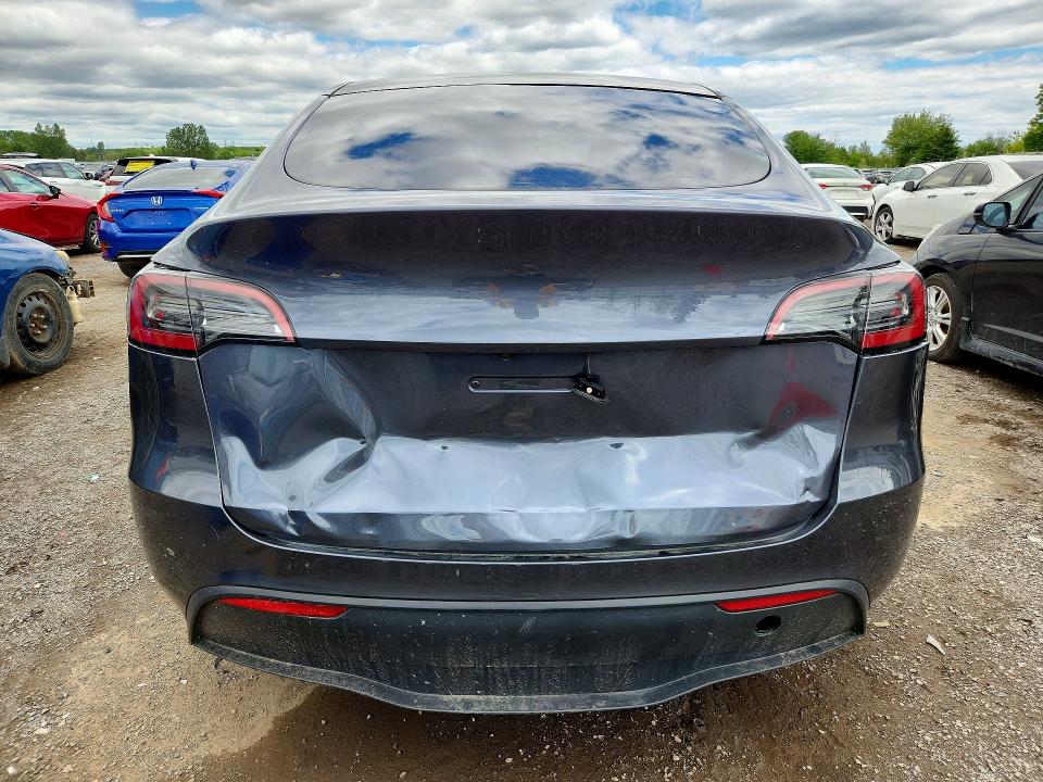 2023 Tesla Model y VIN 7SAYGDEE2PF607607 COPART salvage auction — FRONT END, On - Permit Salvage, sold $12,700 on 2026-07-16 (photo 6)