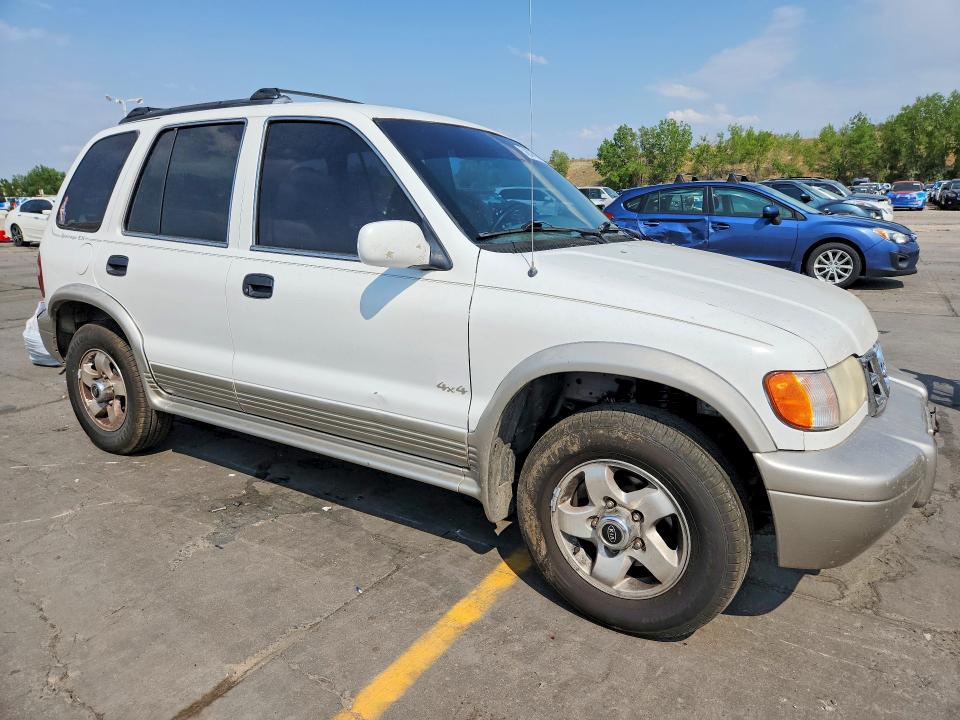 2000 Kia Sportage VIN KNDJA7238Y5644006 COPART salvage auction — SIDE, CO - PUBLIC - SALVAGE TITLE, sold $325 on 2026-07-29 (photo 4)