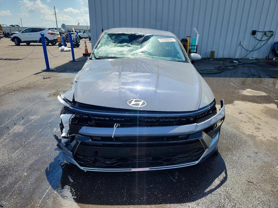 2026 Hyundai Sonata hybrid VIN KMHL24JJ9TA145926 COPART salvage auction — FRONT END, FL - CERTIFICATE OF DESTRUCTION, sold $5,700 on 2026-07-27 (photo 5)