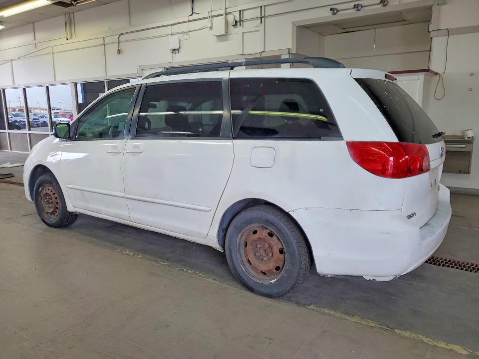 2010 Toyota Sienna VIN 5TDKK4CC0AS303584 COPART salvage auction — MECHANICAL, Wa - Cert Of Ownership-Rebuilt, sold $350 on 2026-07-31 (photo 2)