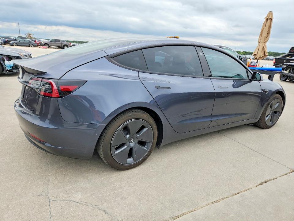2021 Tesla Model 3 VIN 5YJ3E1EA7MF093886 COPART salvage auction — NORMAL WEAR, Tx - Cert Of Title-Rebuilt Salvage (P), sold $12,600 on 2026-07-30 (photo 3)