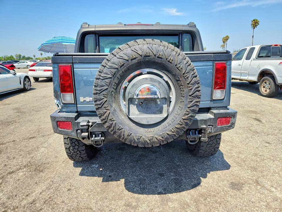 2005 Hummer H2 VIN 5GRGN22U95H115893 COPART salvage auction — SIDE, CA - LIEN PAPERS-SALVAGE OR AC, sold $5,000 on 2026-07-09 (photo 6)